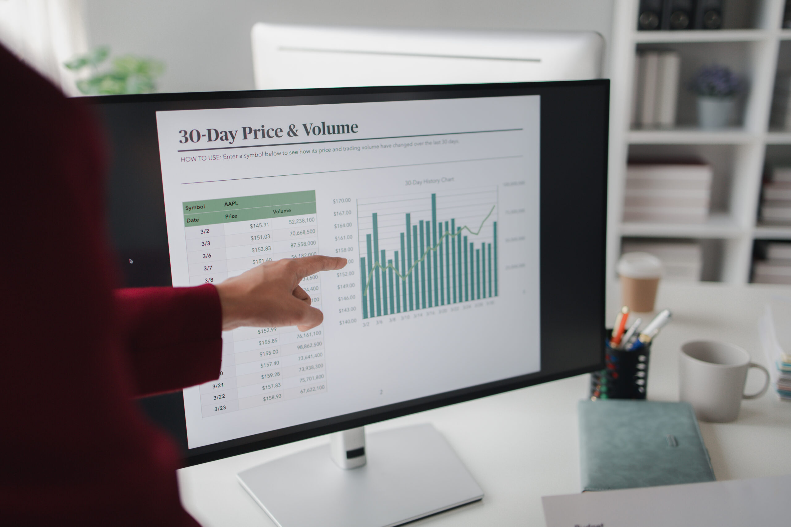 Two people looking at datasheets of marketing and sales results, analysis of business results jointly between executives, department heads and employees to brainstorm company sales management.